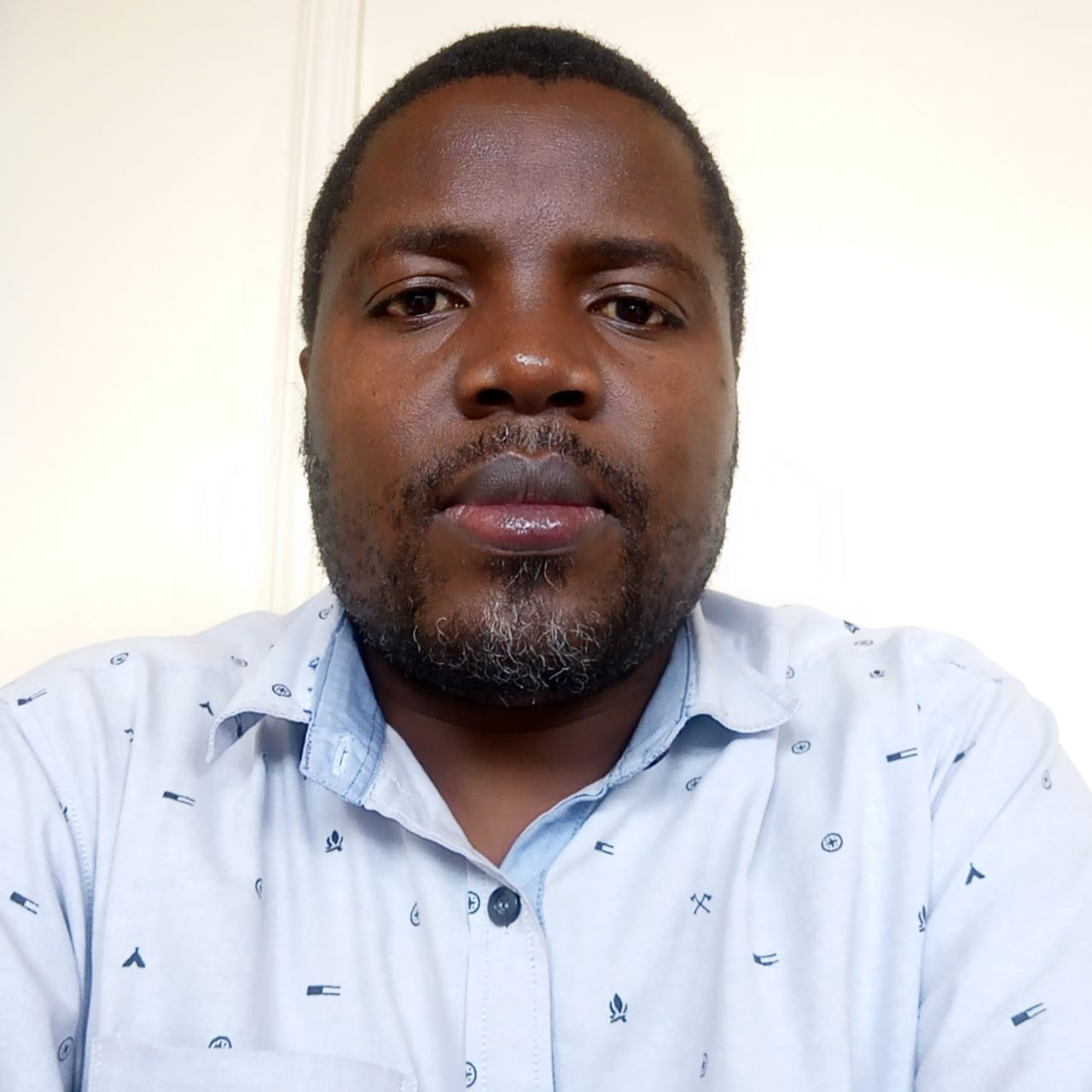 Treasurer-Mr Williat Anyika